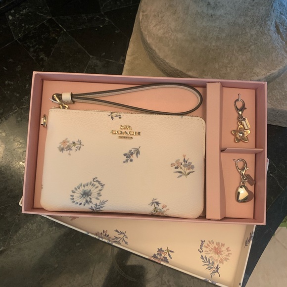 Adorable Coach Wristlet with charms. - Picture 2 of 9